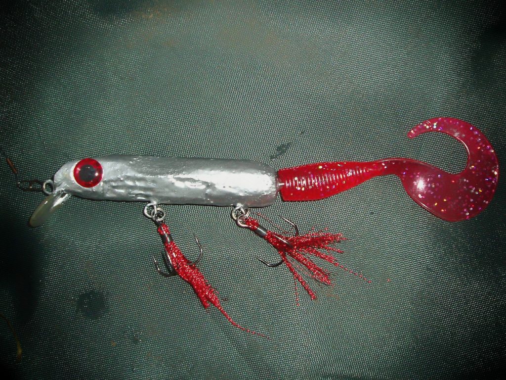 Home-made hybrid lure with silver paint finish and a long jelly tail