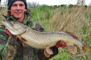 Andrew with an upper-double specimen pike from a canal