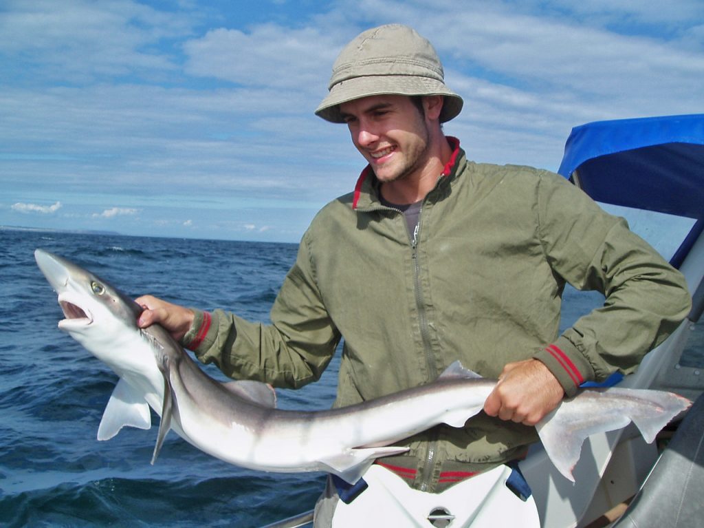 Craig with his fiorst tope shark of the day.