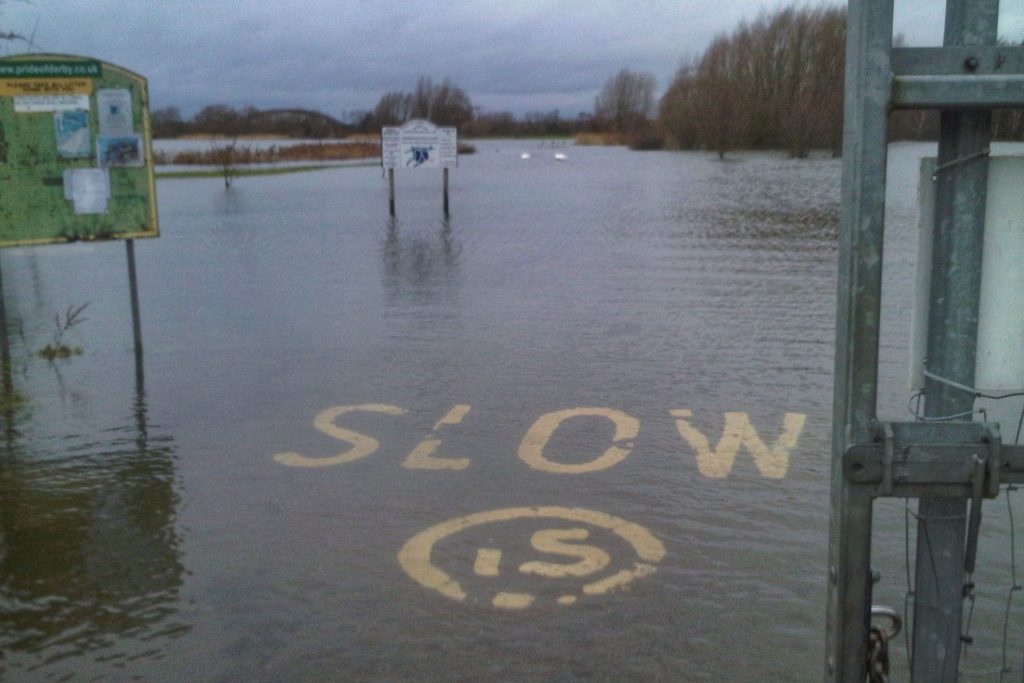 Gateway to the Pride of Derby gravel pit complex underwater due to winter flooding of the River Trent