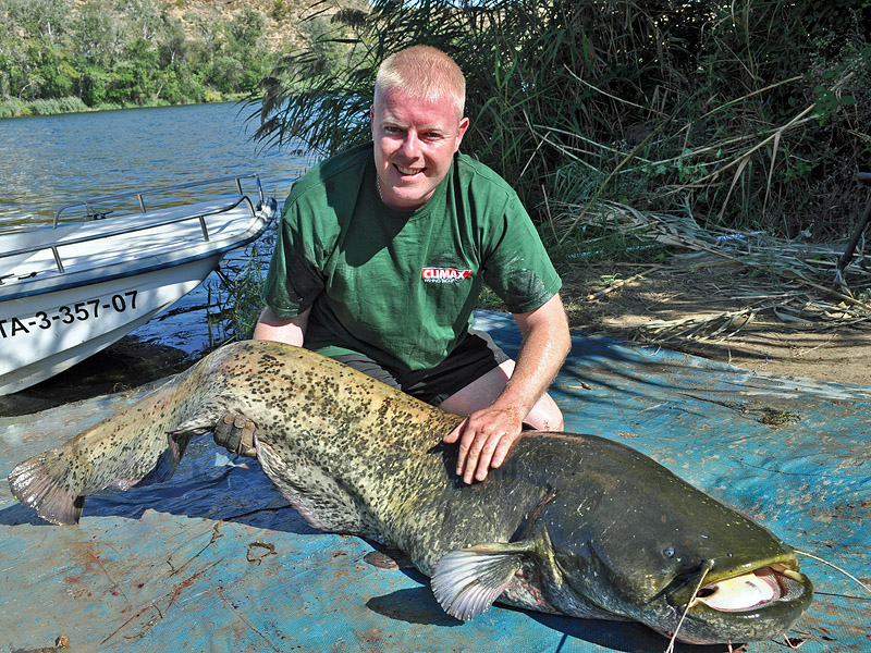 Shane Calton with his 88lb River Ebro catfish