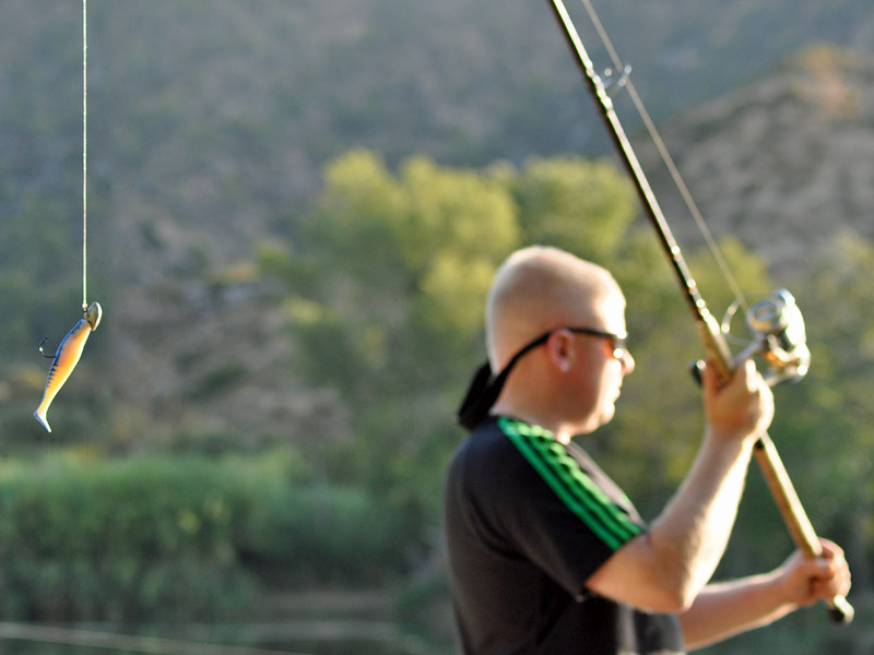 Shane casting a jig for catfish