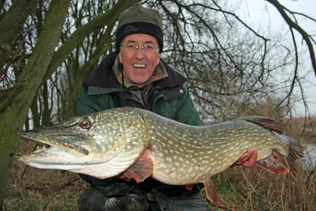 Bob Roberts with a fine drain pike from Caught In The Act