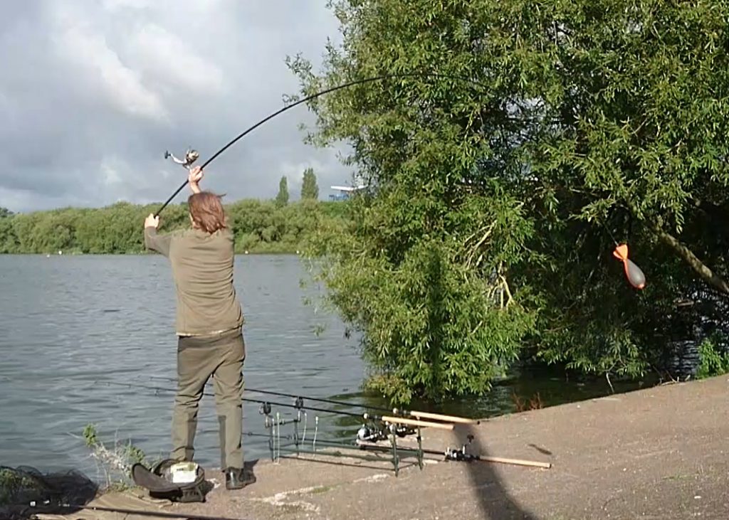 Casting out a loaded Spomb with the Fox Warrior+ S&M Spod & Marker Duo rod