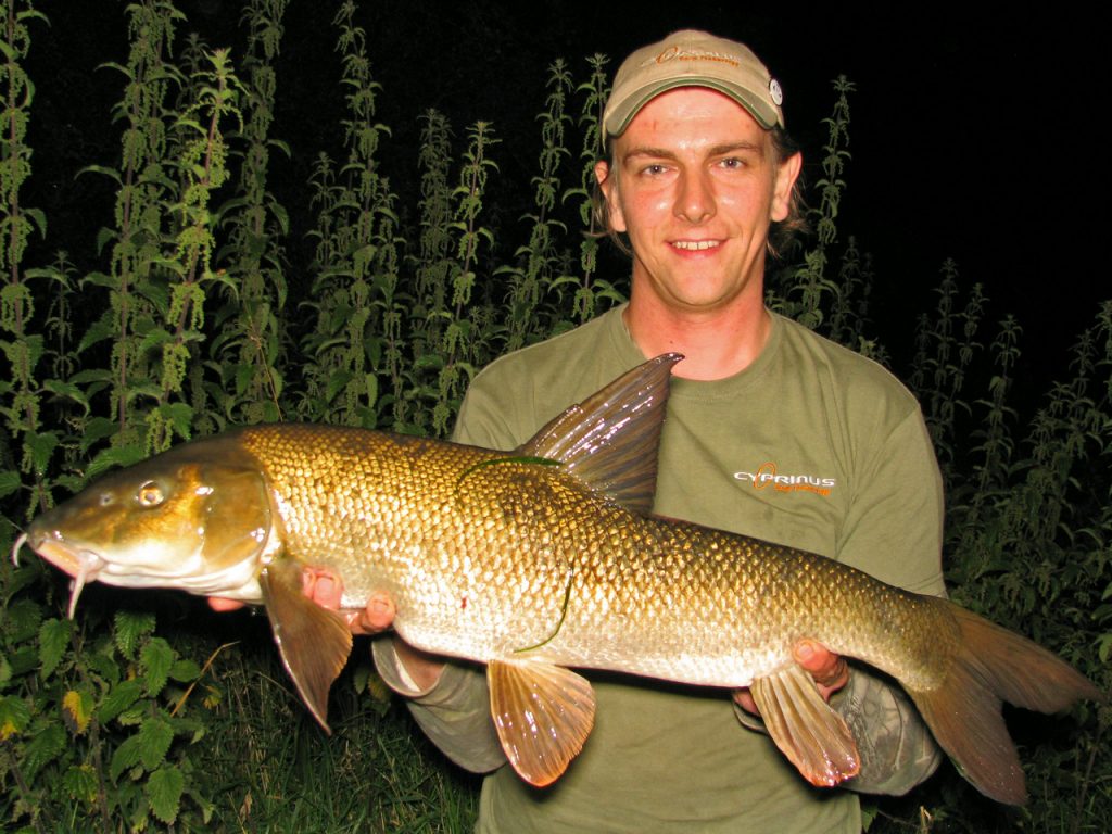 Andrew with a summer barbel from the Derbyshire Derwent