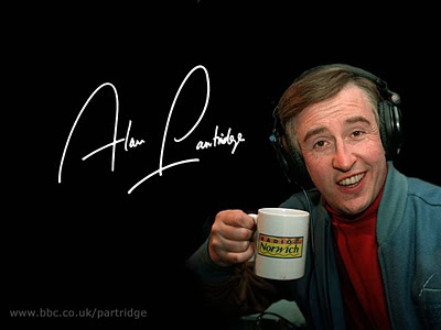 Alan Partridge with his Radio Norwich mug. Up with the Partridge.